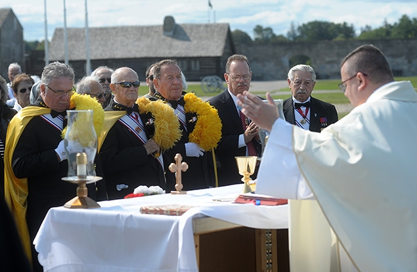 Father Jeffrey L. Nowak, of St. Vincent de Paul Parish, Niagara Falls, presides over the 91st annual Pilgrimage and Mass at the Father Millet Cross at Old Fort Niagara Sept. 10. The Knights of Columbus and area Catholics also celebrated the Mass. Since 1926, the Knights of Columbus have been celebrating a Mass at 